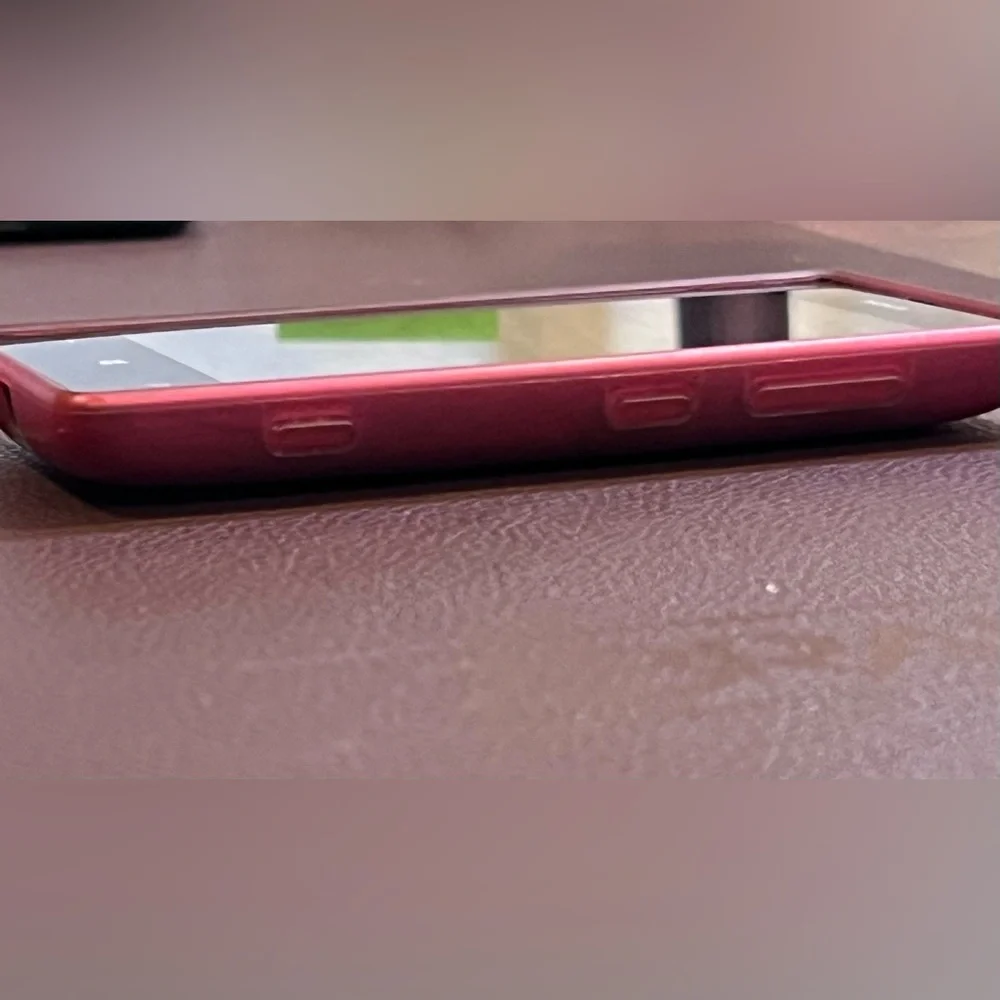 Windows Nokia Lumia 520 Smartphone with Pink Case